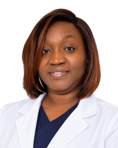 Prisca Oketch wearing a white coat